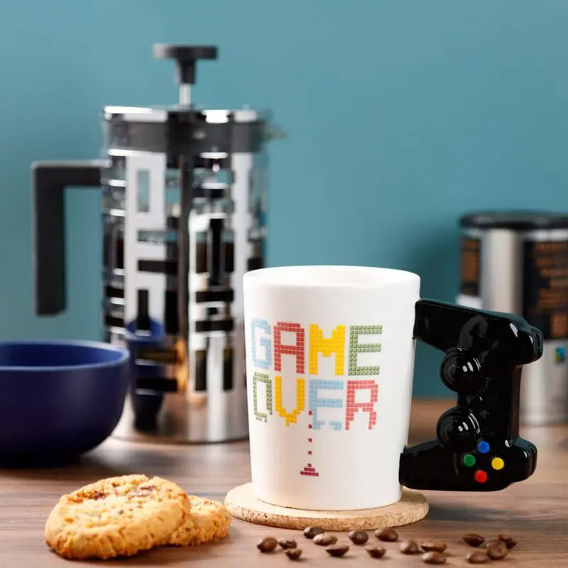 Taza de Cerámica Asa con Forma de Mando Videojuegos Game Over