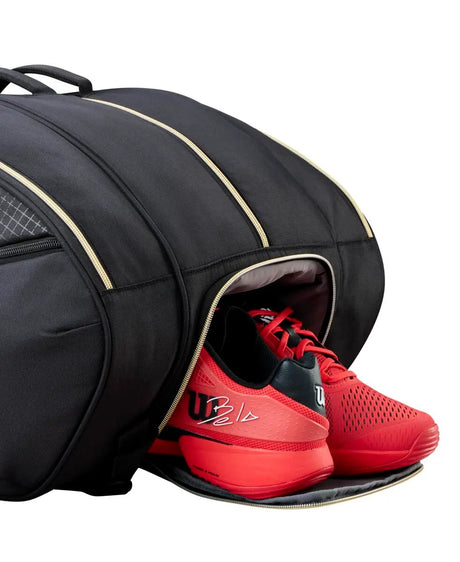 Paletero Wilson Defy V1 Negro/Dorado 2026