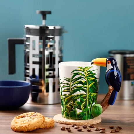 Taza de Cerámica Asa con Forma de Tucán y Decoración Jungla